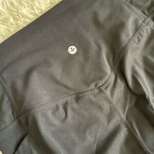 Halara SoCinched High waisted tummy control leggings with side pockets. Medium.